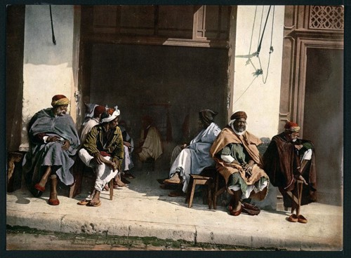 [Arabs before a cafe, Algiers, Algeria]